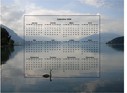Calendrier 2026 annuel, format paysage, quatre colonnes par trois lignes, incrusté au centre d'une photo