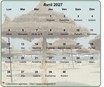 Calendrier d'avril 2027 à imprimer, en transparence sur une photo